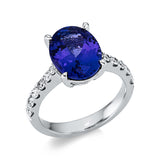 Ring 14 kt WG, 12 Brill. 0,51 ct, TW-si, 1 Tansanit 5,01 ct blau