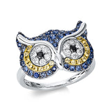 Ring 18 kt WG+GG, 12 Brill. 0,20 ct, TW-vsi, 2 Brill. 0,04 ct, schwarz, 16 Saphire 0,16 ct gelb, 53 Saphire 0,63 ct blau