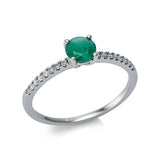 Ring 18 kt WG, 16 Brill. 0,10 ct, TW-si, 1 Smaragd 0,35 ct grün