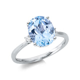 Ring 18 kt WG, 2 Brill. 0,04 ct, TW-si, 1 Topas 3,35 ct sky blue