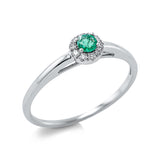 Ring 18 kt WG, 10 Brill. 0,07 ct, TW-si, 1 Smaragd 0,11 ct grün