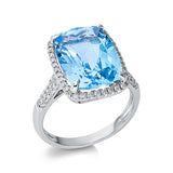 Ring 18 kt WG, 76 Brill. 0,37 ct, TW-si, 1 Topas 8,20 ct sky blue