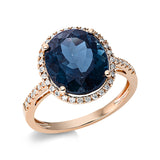 Ring 18 kt RG, 42 Brill. 0,19 ct, TW-si, 1 Topas 6,30 ct Lond. blue