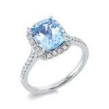 Ring 18 kt WG, 18 Brill. 0,16 ct, TW-si, 32 Brill. 0,20 ct, TW-si, 1 Topas 2,48 ct blau
