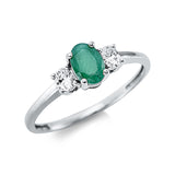 Ring 18 kt WG, 2 Oval 0,20 ct, TW-si, 1 Smaragd 0,44 ct grün