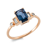 Ring 18 kt RG, 2 Brill. 0,03 ct, TW-si, 2 Bag. 0,09 ct, TW-si, 1 Topas 1,15 ct Lond. blue