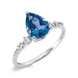 Ring 18 kt WG, 2 Brill. 0,07 ct, TW-si, 4 Dia. 0,01 ct, TW-si, 2 Brill. 0,04 ct, TW-si, 1 Topas 1,48 ct Lond. blue