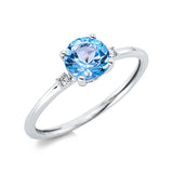 Ring 18 kt WG, 2 Brill. 0,03 ct, TW-si, 1 Topas 1,02 ct blau