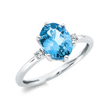 Ring 18 kt WG, 2 Brill. 0,04 ct, TW-si, 1 Topas 2,04 ct blau