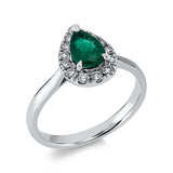 Ring 18 kt WG, 14 Brill. 0,24 ct, TW-si, 1 Smaragd 0,74 ct grün