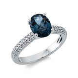 Ring 18 kt WG, 53 Brill. 0,20 ct, TW-si, 1 Topas 2,50 ct Lond. blue
