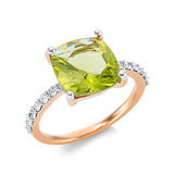 Ring 18 kt GG, Fassung rhodiniert, 12 Brill. 0,26 ct, TW-si, 1 Peridot 3,64 ct grün