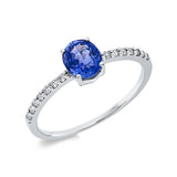 Ring 18 kt WG, 14 Brill. 0,10 ct, TW-pi, 1 Saphir 0,97 ct blau