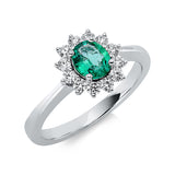 Ring 18 kt WG, 12 Brill. 0,31 ct, TW-vsi, 1 Smaragd 0,52 ct
