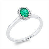 Ring 18 kt WG, 14 Brill. 0,13 ct, TW-si, 1 Smaragd 0,39 ct grün