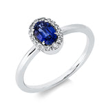 Ring 18 kt WG, 16 Brill. 0,12 ct, W-si, 1 Saphir 0,52 ct blau
