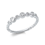Ring 18 kt WG, 4 Brill. 0,09 ct, TW-si, 3 Brill. 0,19 ct, TW-si