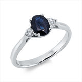 Ring 18 kt WG, 2 Brill. 0,14 ct, TW-si, 1 Saphir 0,93 ct blau