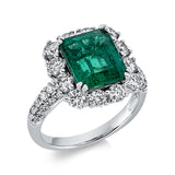 Ring 18 kt WG, 12 Brill. 1,14 ct, TW-vsi/si, 30 Brill. 0,31 ct, TW-vsi/si, 1 Smaragd 3,50 ct grün