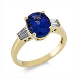 Ring 18 kt GG, 4 Trap. 0,17 ct, TW-si, 1 Tansanit 2,53 ct blau