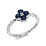 Ring 18 kt WG, 1 Brill. 0,02 ct, TW-si, 4 Saphire 0,61 ct blau