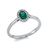 Ring 18 kt WG, 16 Brill. 0,07 ct, TW-si, 1 Smaragd 0,42 ct grün
