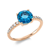 Ring 18 kt RG, 12 Brill. 0,20 ct, TW-si, 1 Blautopas 2,19 ct Swiss blue