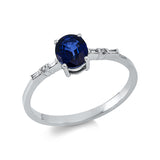 Ring 14 kt WG, 4 Bag. 0,03 ct, F-vsi, 2 Brill. 0,01 ct, F-si, 1 Saphir 0,72 ct blau
