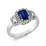 Ring 18 kt WG, 2 Trap. 0,25 ct, TW-vsi, 30 Brill. 0,30 ct, TW-vsi, 1 Saphir 1,45 ct blau