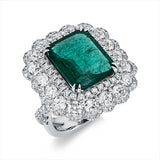 Ring 18 kt WG, 78 Brill. 3,37 ct, TW-si, 64 Brill. 0,39 ct, TW-si, 1 Smaragd 7,54 ct grün
