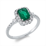 Ring 18 kt WG, 2 Brill. 0,08 ct, TW-si, 26 Brill. 0,37 ct, TW-si, 1 Smaragd 1,05 ct grün