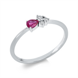 Ring 18 kt WG, 3 Brill. 0,08 ct, W-si, 1 Rubin 0,15 ct rot