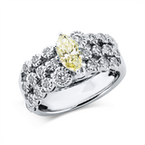 Ring 18 kt WG, 26 Brill. 0,61 ct, TW-si, 1 Nav. 0,77 ct, gelb