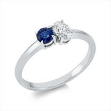 Ring 18 kt WG, 1 Oval 0,31 ct, TW-si, 1 Saphir 0,33 ct blau