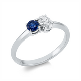 Ring 18 kt WG, 1 Oval 0,32 ct, TW-si, 1 Saphir 0,29 ct blau