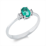 Ring 18 kt WG, 2 Brill. 0,03 ct, TW-si, 1 Smaragd 0,62 ct grün