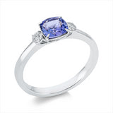 Ring 18 kt WG, 2 Brill. 0,15 ct, TW-si, 1 Tansanit 0,89 ct blau