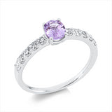 Ring 18 kt WG, 10 Brill. 0,45 ct, TW-si, 1 Saphir 0,68 ct pink