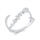 Ring 18 kt WG, 1 Nav. 0,10 ct, 2 Ov 0,23 ct, 1 Tro 0,10 ct, 1 Princ. 0,10 ct, 31 Brill. 0,19 ct, TW-si