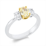Ring 18 kt WG+GG, GIA6232060708, 1 Oval 1,14 ct, gelb-si2, 2 Oval 0,42 ct, TW-si