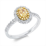 Ring 18 kt WG+GG, 26 Brill. 0,42 ct, TW-si, 1 Oval 0,52 ct, gelb, 16 Brill. 0,06 ct, gelb