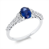 Ring 18 kt WG, 14 Brill. 0,48 ct, F-vsi/si, 1 Saphir 0,92 ct blau