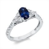 Ring 18 kt WG, 6 Tropfen 0,30 ct, TW-si, 34 Brill. 0,30 ct, TW-si, 1 Saphir 1,03 ct blau