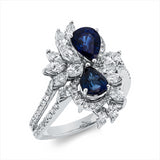Ring 18 kt WG, 14 Nav. 1,14 ct, F-vsi/si, 54 Brill. 0,34 ct, F-vsi/si, 2 Saphire 1,81 ct blau