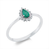 Ring 18 kt WG, 13 Brill. 0,09 ct, TW-si, 1 Smaragd 0,19 ct grün