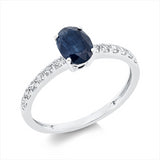 Ring 18 kt WG, 12 Brill. 0,22 ct, TW-si, 1 Saphir 1,18 ct blau
