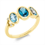 Ring 14 kt GG, 4 Brill. 0,03 ct, TW-si, 1 Topas 0,83 ct Lond. blue, 2 Topase 1,28 ct Lond. blue