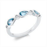 Ring 14 kt WG, 4 Brill. 0,05 ct, TW-si, 3 Topase 0,74 ct blau