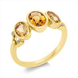 Ring 14 kt GG, 4 Brill. 0,03 ct, TW-si, 1 Citrin 0,66 ct gelb, 2 Citrin 0,98 ct mandarin