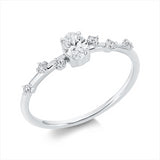 Ring 18 kt WG, 1 Oval 0,25 ct, TW-si, 6 Brill. 0,08 ct, TW-si